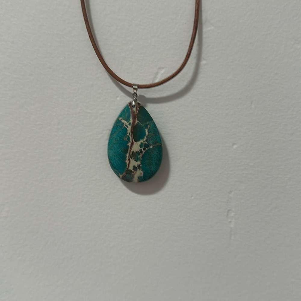 Turquoise, leather necklace 18 inches long adjustable